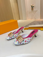 Louis Vuitton ladies mules, multicolor monogram print, gold buckle emblem, pink insoles, low heels