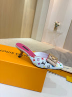 Louis Vuitton ladies mule with multicolor monogram print, gold buckle, pink interior