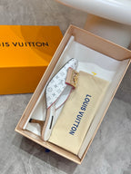 Louis Vuitton monogram mule in box with gold buckle and light blue straps