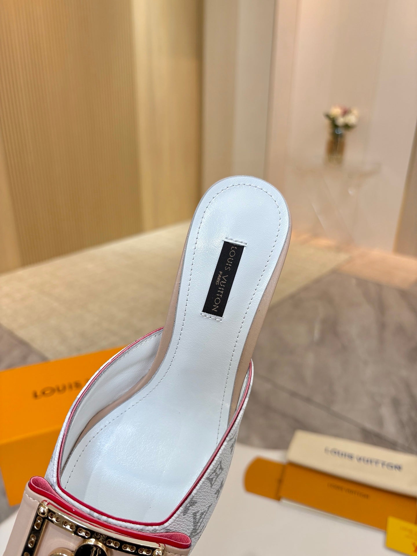 Louis Vuitton light blue mule with logo lining and red-trim edge
