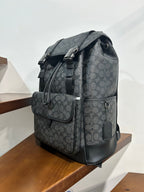 Charcoal monogram backpack with front zip pocket and top handle