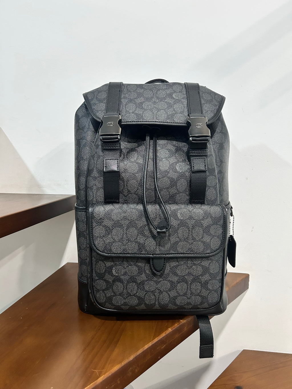 Charcoal monogram backpack with front straps and top handle