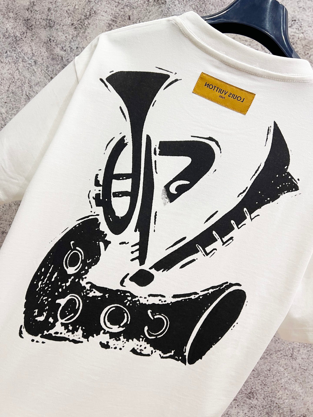 Louis Vuitton white T-shirt, close-up back graphic print