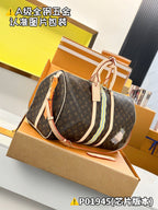 Monogram duffel bag with striped center panel and side leather strap