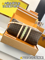 Monogram duffel bag with striped center panel and dual top handle straps