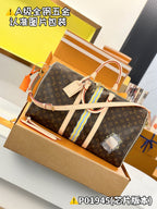 Monogram duffel bag with striped center panel and orange crossbody strap
