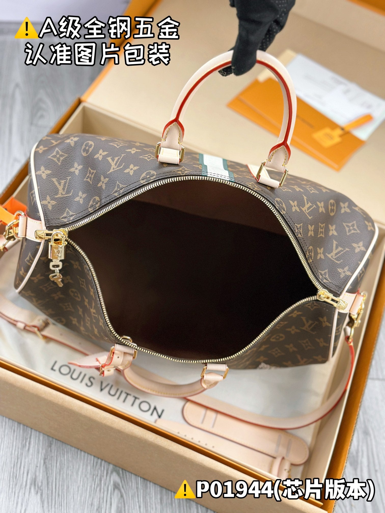 Men's monogram tote bag with open top, light handles, and gold zipper trim