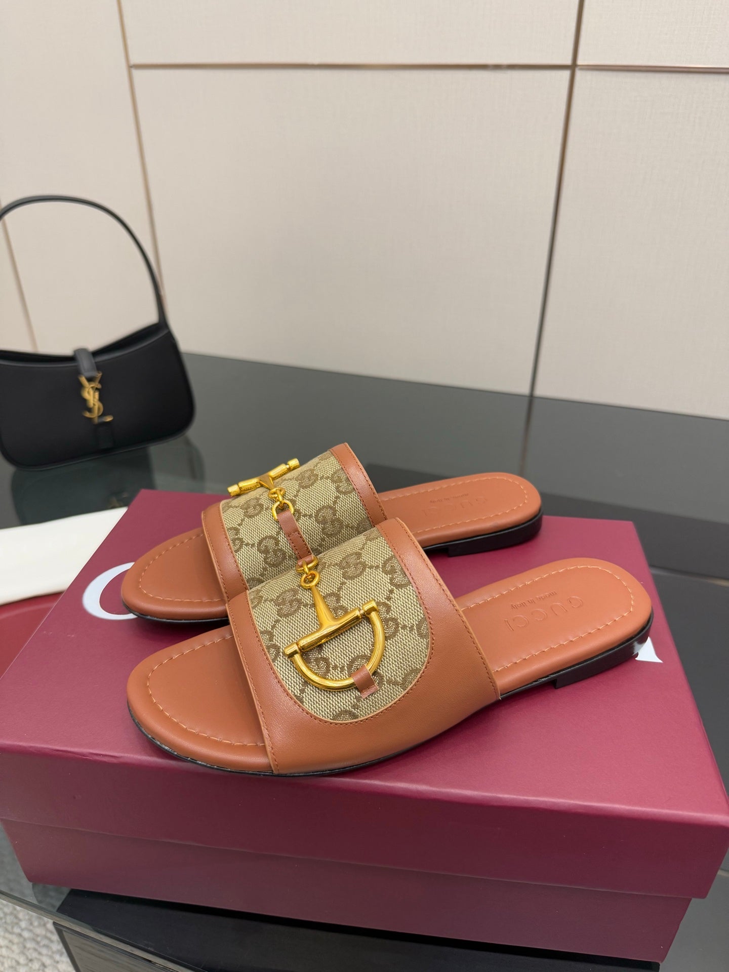Gucci ladies slide sandals, GG canvas band with gold buckle, tan footbed