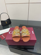Gucci ladies slide sandals, tan footbed, GG canvas strap with gold buckle