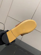 Gucci ladies slide sandal outsole, yellow rubber sole with stamped branding