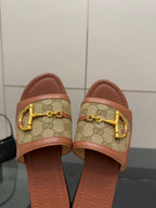 Gucci ladies slide sandals, GG canvas band with gold buckle and tan leather edges