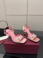Pink heeled sandals with jeweled double-buckle detail and ankle strap