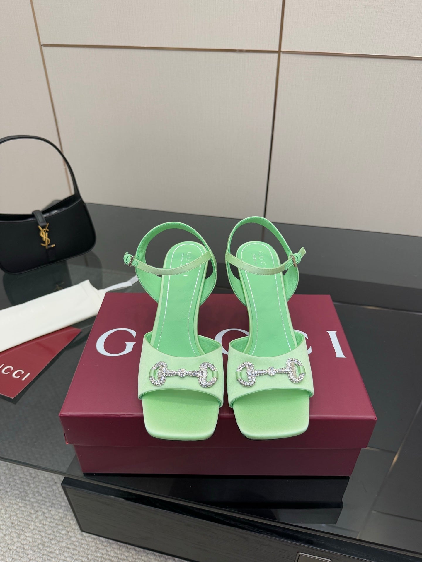 Mint green heeled sandals with rhinestone buckle, slingback straps, stiletto heels