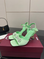 Mint green slingback heeled sandals with rhinestone buckle and ankle strap, stiletto