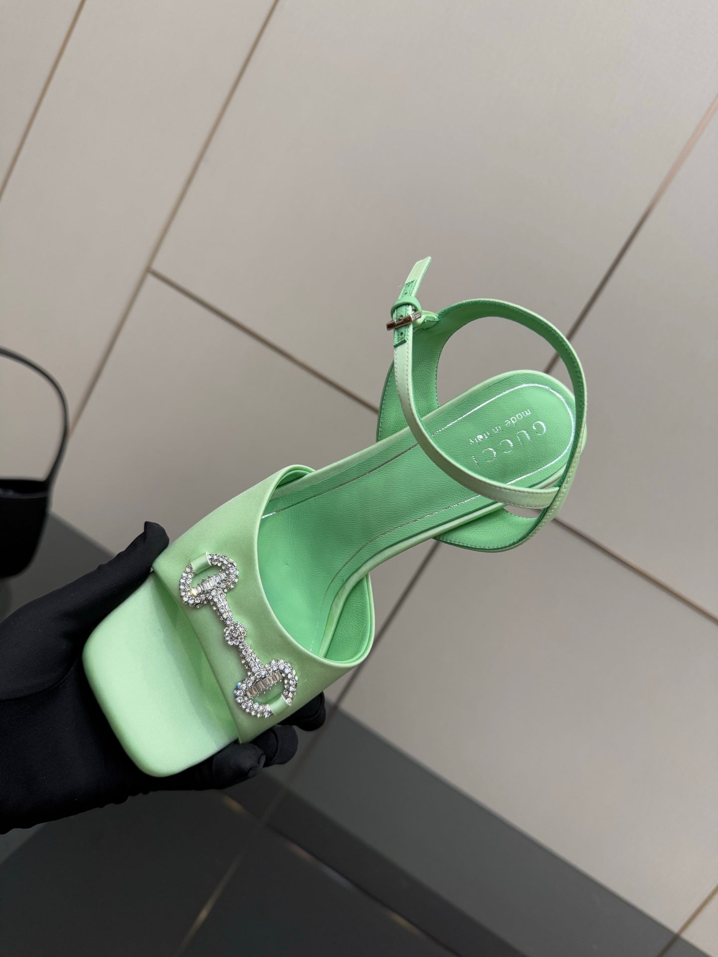 Mint green slingback heeled sandal with rhinestone buckle, side view