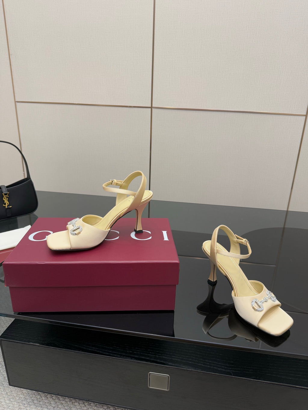 Gucci ladies cream slingback heels with thin ankle strap and rhinestone buckle