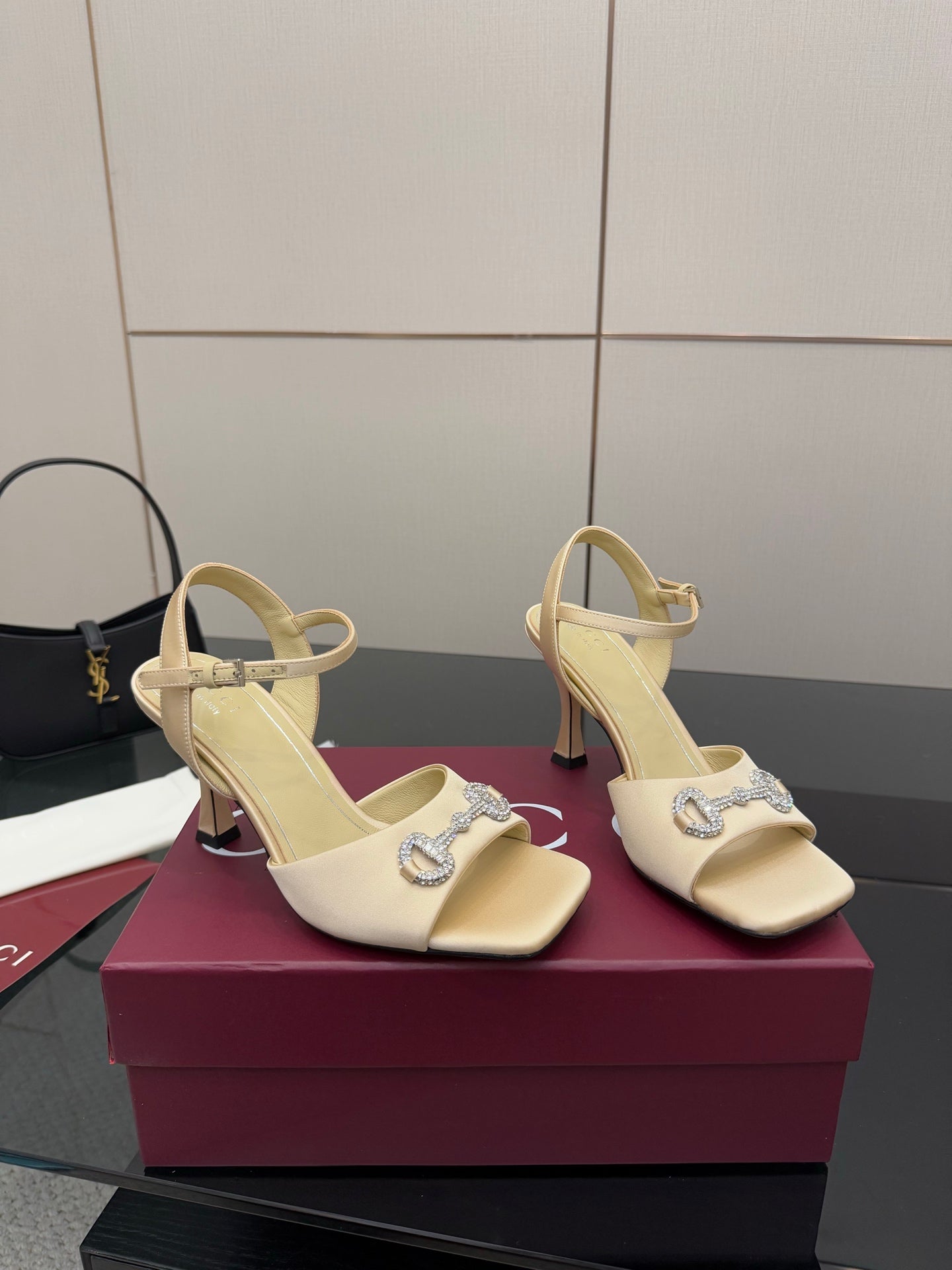 Gucci ladies cream slingback stiletto heels with rhinestone logo detail
