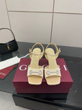 Gucci ladies cream slingback heels with decorative rhinestone buckle on strap