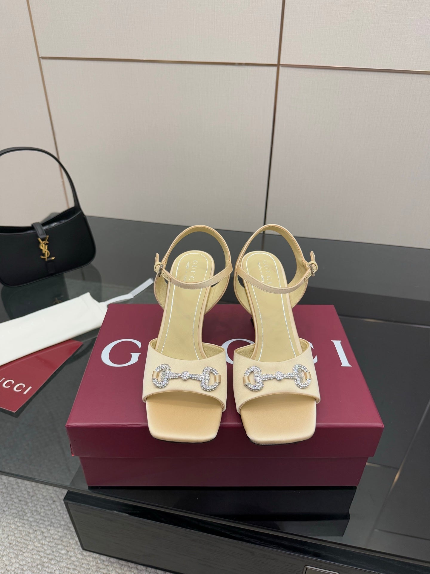 Gucci ladies cream slingback heels with decorative rhinestone buckle on strap