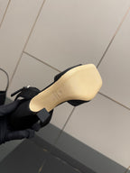 Gucci ladies sandal outsole view, beige sole with black heel base