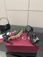 Gucci ladies open-toe heeled sandal in black with silver-tone chain-like logo