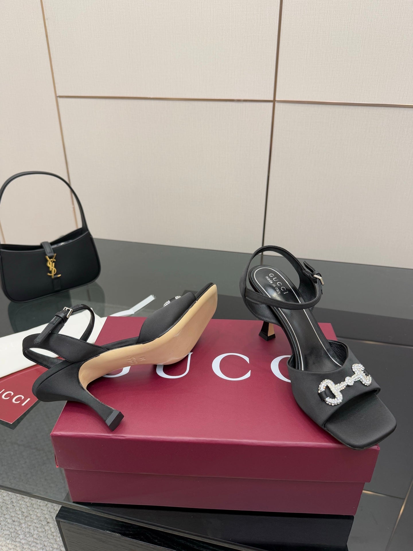 Gucci ladies open-toe heeled sandal in black with silver-tone chain-like logo