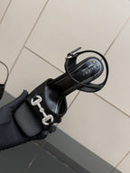 Gucci ladies heeled sandal strap detail in black with silver-tone logo hardware