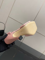 Gucci ladies pink satin heeled sandals, showing sole underside and heel profile