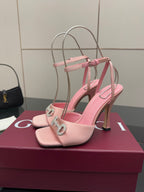 Gucci ladies pink heeled sandals with open toe, rhinestone buckle, and ankle strap