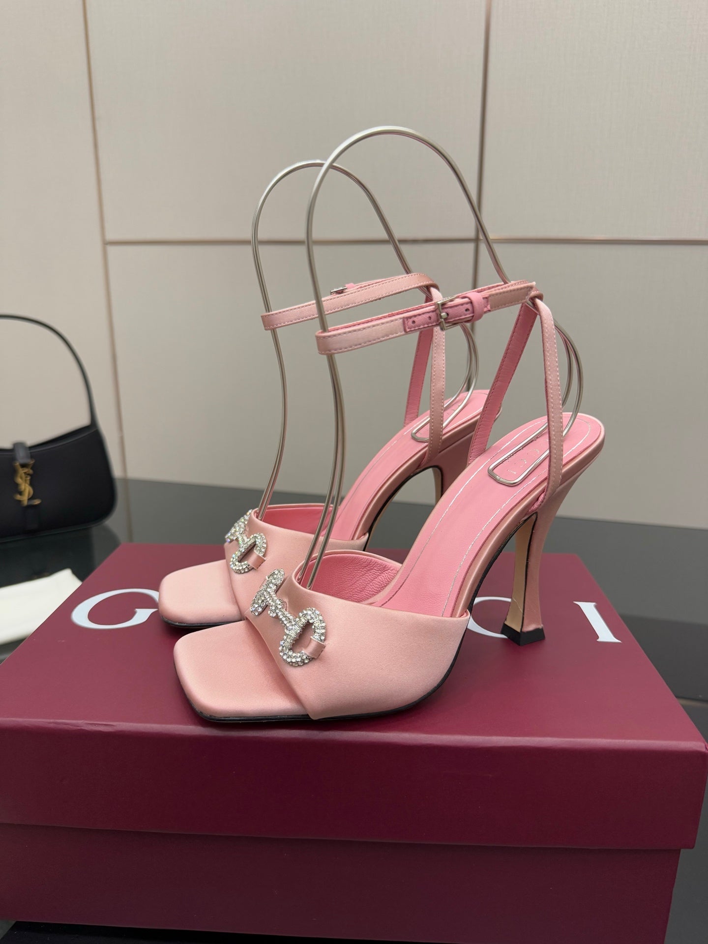 Gucci ladies pink heeled sandals with open toe, rhinestone buckle, and ankle strap