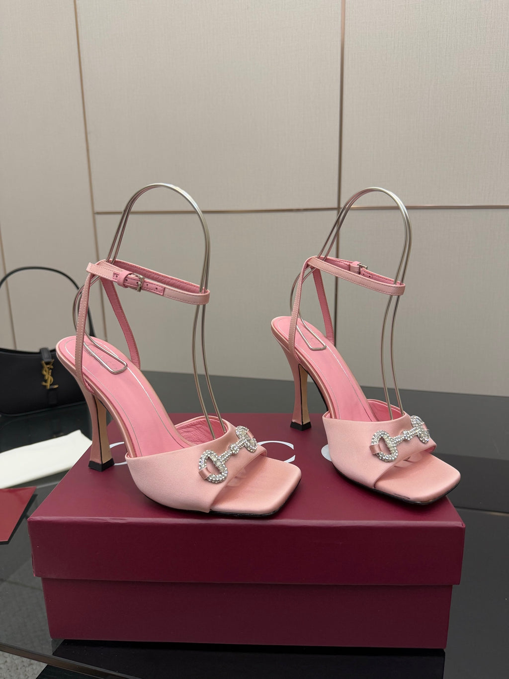 Gucci ladies pink satin heeled sandals with open toe, crystal buckle, and clear straps