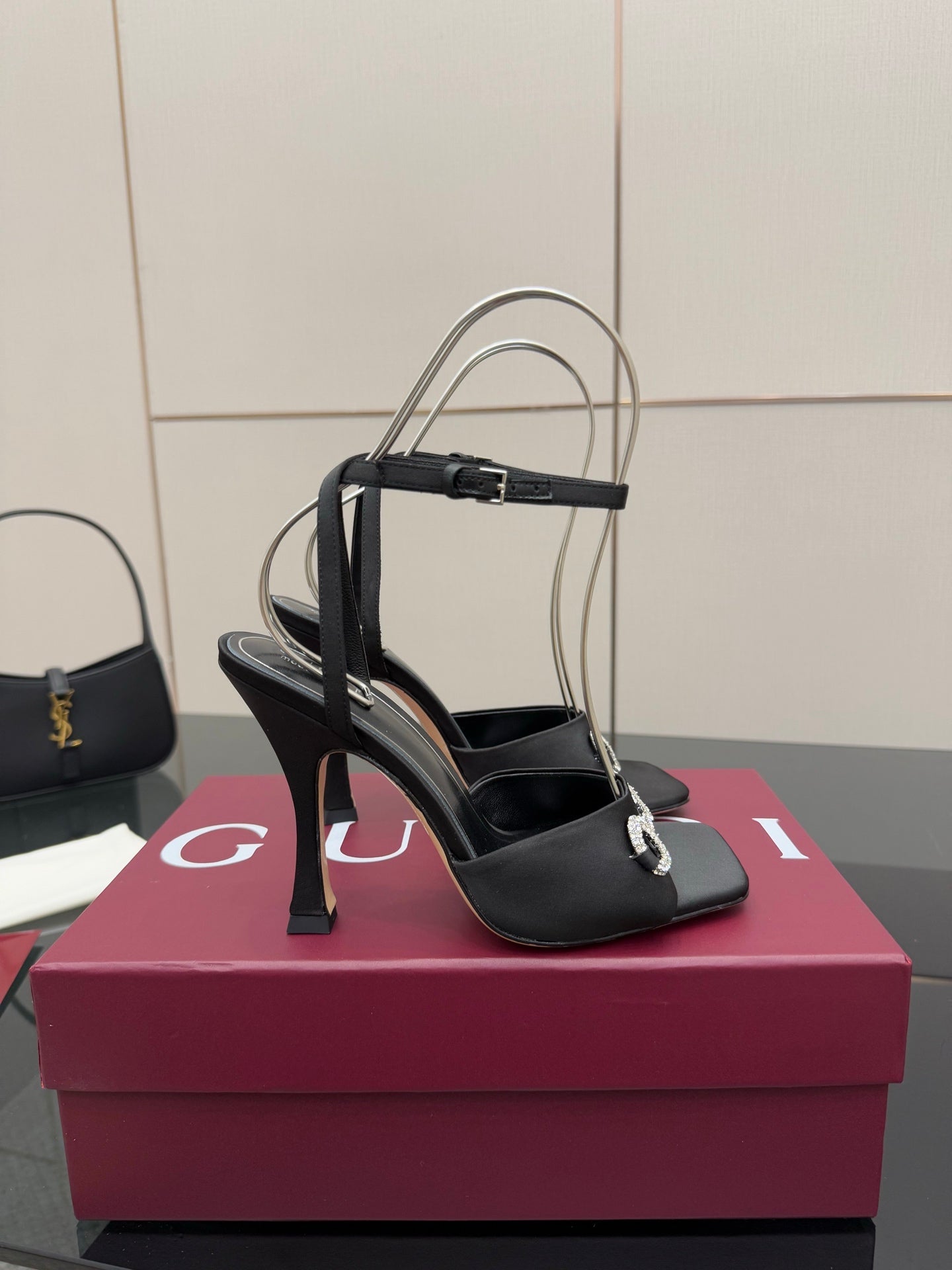 Gucci ladies black high-heel sandals with silver-tone embellished strap and stiletto heel