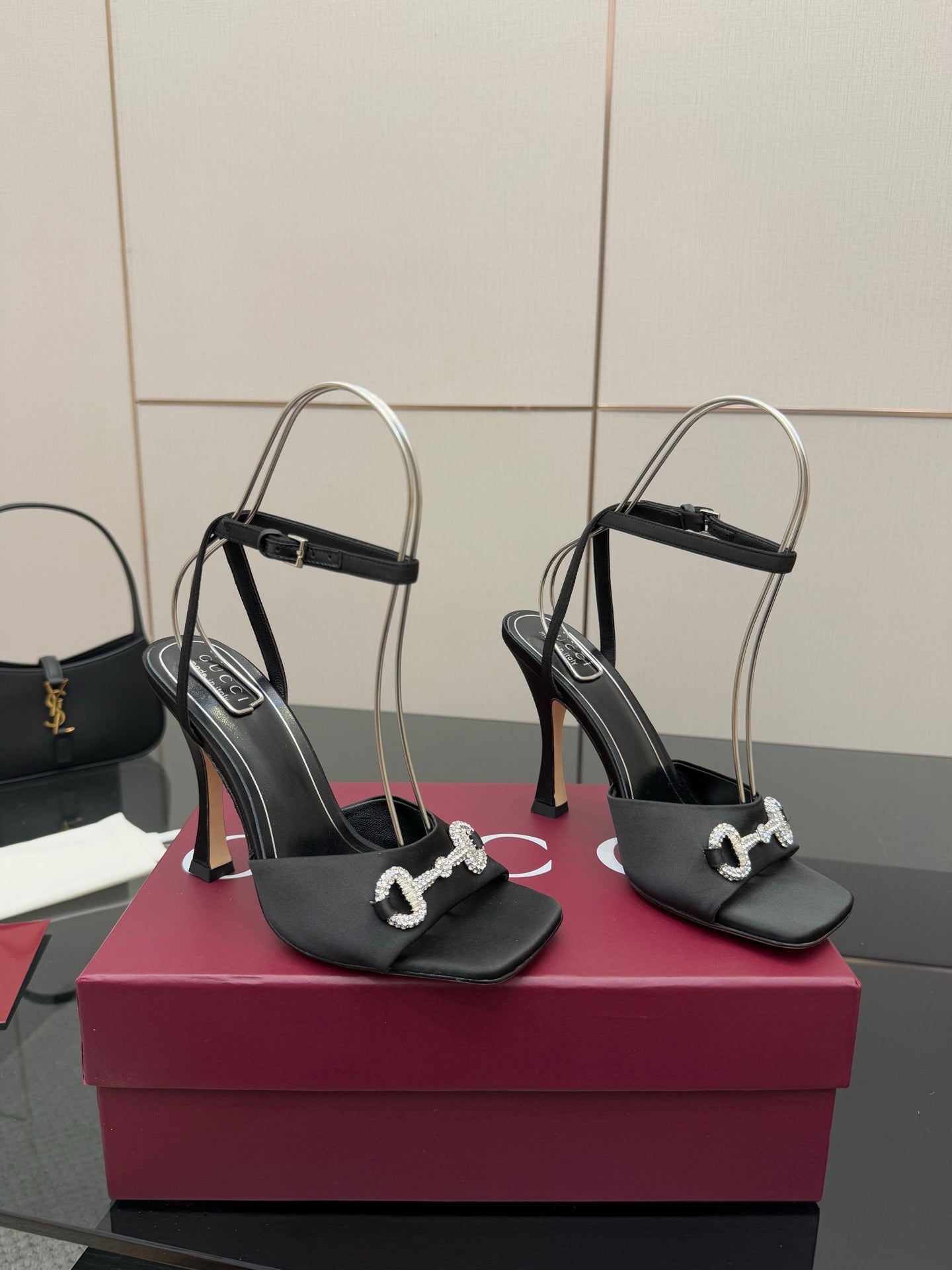 Gucci ladies black heeled sandals with silver-tone buckles and slim ankle straps