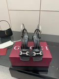 Gucci ladies black heeled sandals with silver-tone embellished ankle strap and buckle