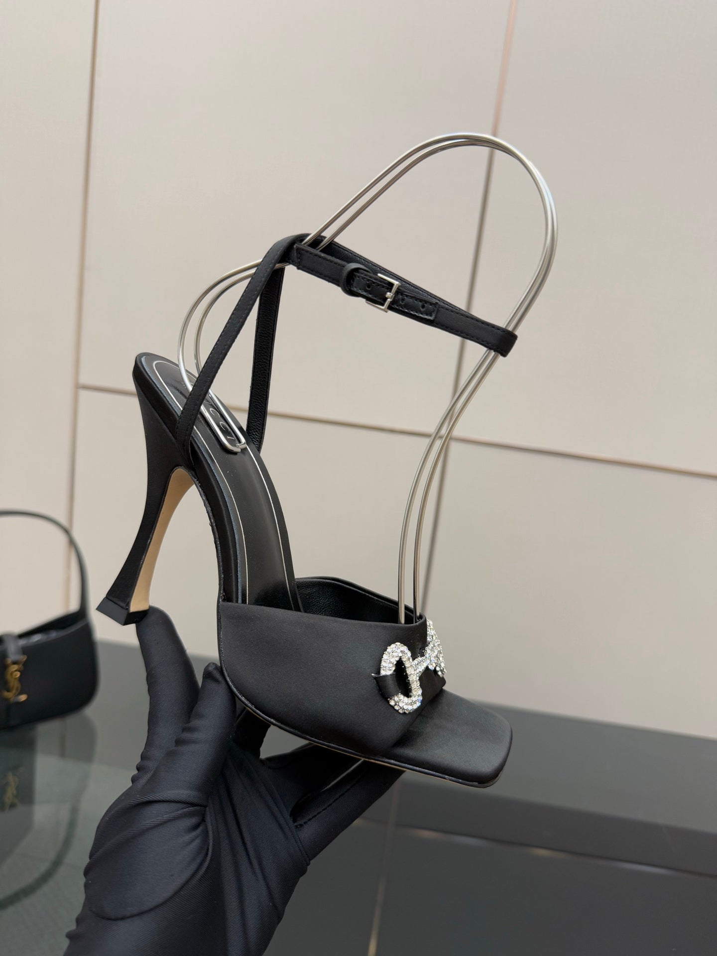 Gucci ladies black heeled sandal with silver-tone embellished buckle and thin heel