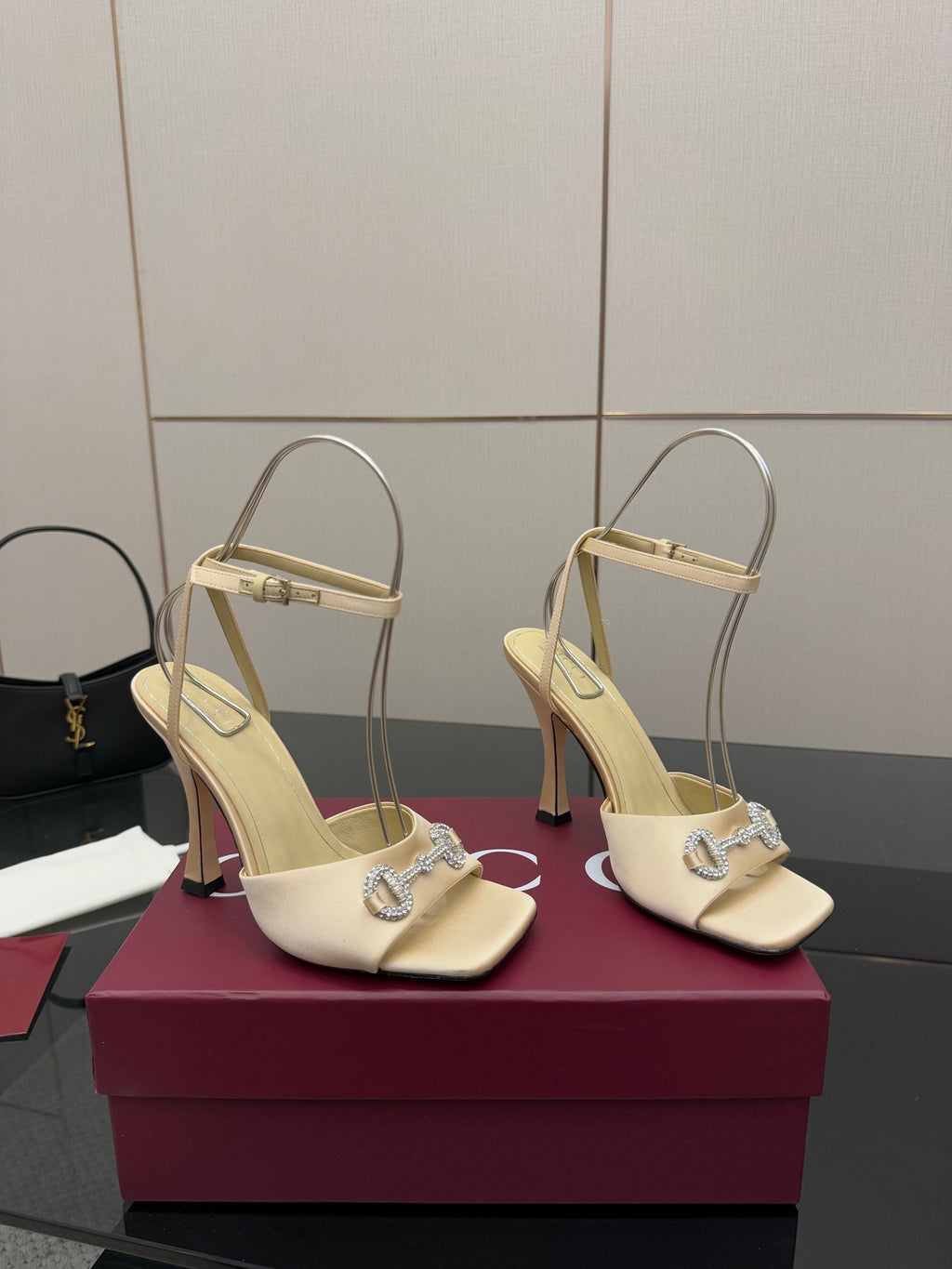 Cream slingback sandals with pointed toe, rhinestone strap, slim high heel