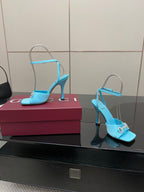 Women’s sky-blue heeled sandals with thin stiletto heel and ankle strap with charm