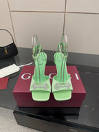 Gucci green open-toe heeled sandal with slingback strap and silver-tone hardware