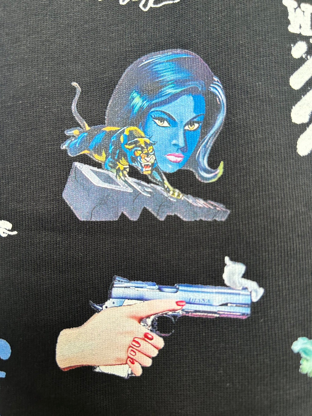 Off-White black T-shirt close-up of blue character illustration with hand holding device