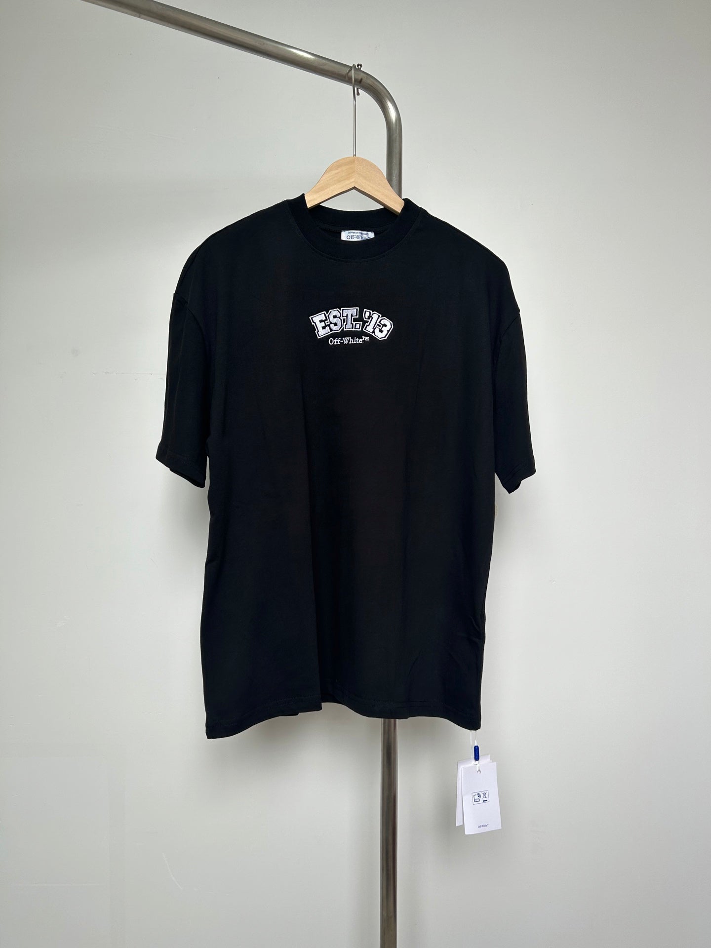 Off-White black short-sleeve T-shirt with EST. 1970 logo graphic on front