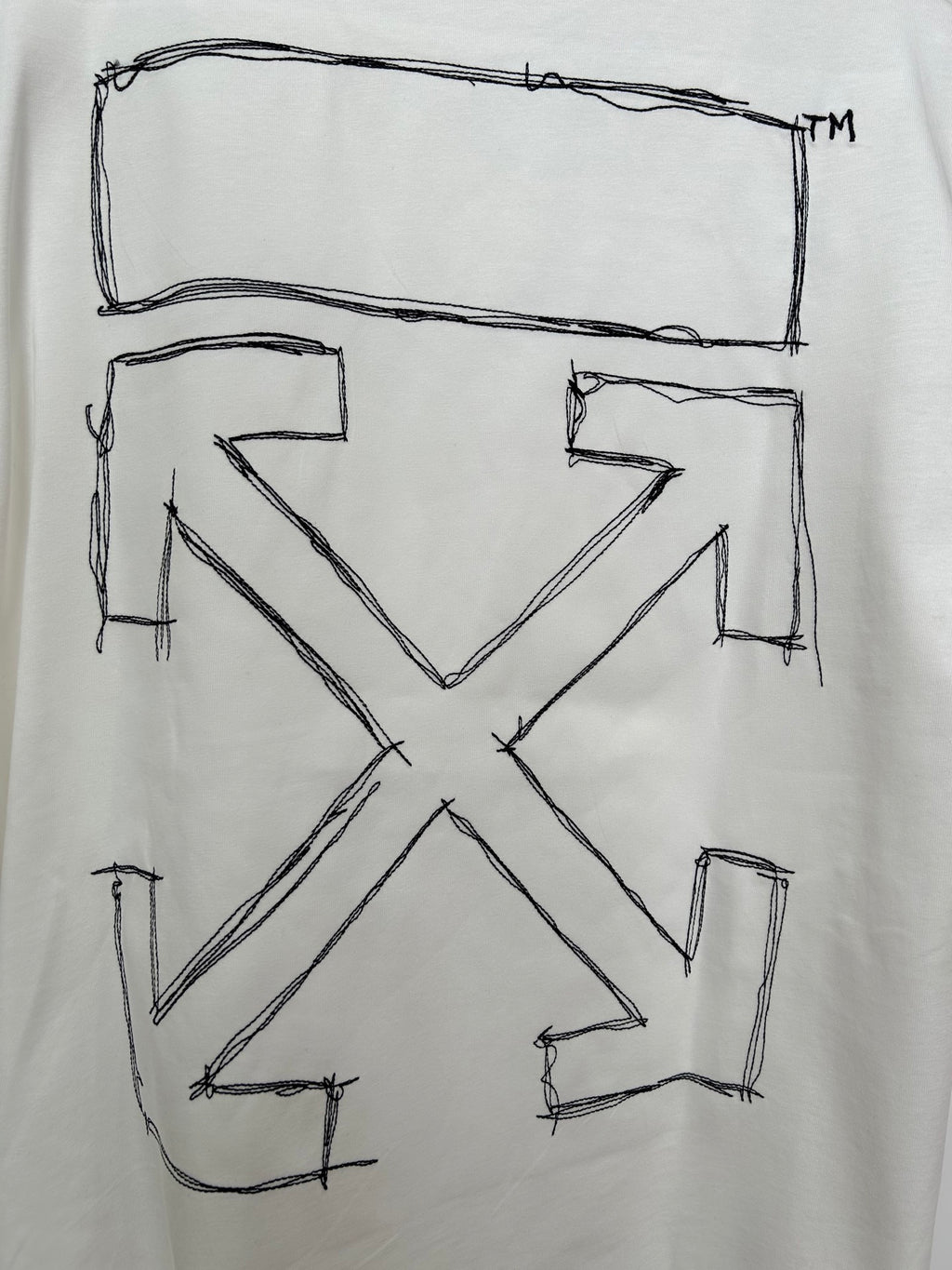 Off-white T-shirt back close-up of large outlined X graphic