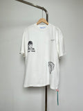 Off-white T-shirt with front cartoon graphic and small chest logo