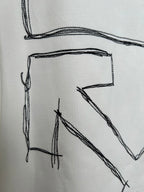 Off-white T-shirt back graphic detail: large letter-like line sketch