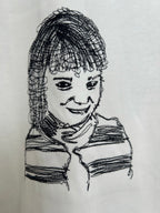 Off-white T-shirt close-up of black line portrait face graphic
