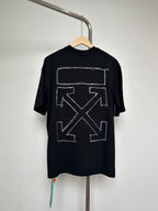 Black T-shirt with large white rectangular graphic and arrow X design