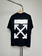 Dark short-sleeve T-shirt with large white X arrow graphic and teal logo