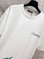 White T-shirt with small Louis Vuitton script logo on the chest