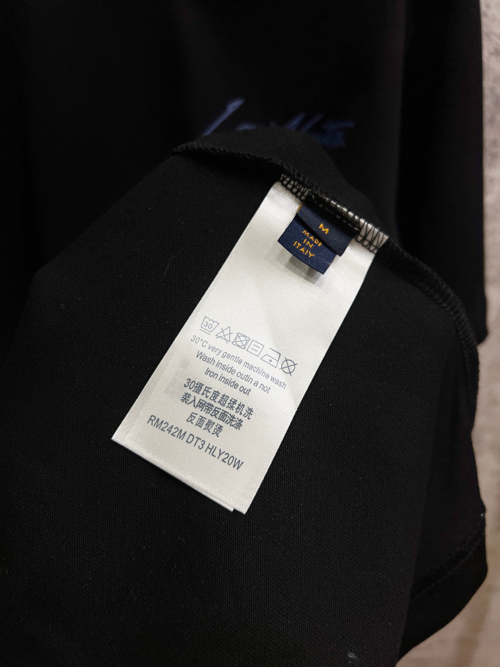 Black Louis Vuitton T-shirt with inner size and care label on neckline seam