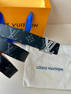 Louis Vuitton monogram belt with silver buckle and printed dark strap