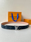 Louis Vuitton monogram belt with silver-toned buckle and dark canvas strap